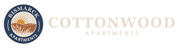 The image is a logo for Cottonwood Apartments.